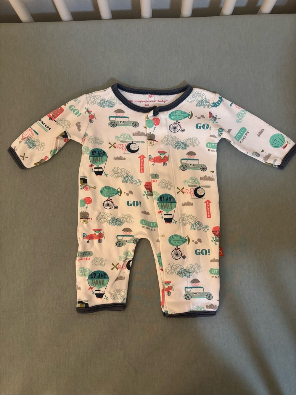 Magnificent baby by magnetic me White & Teal Air Travel Print Baby One-Piece